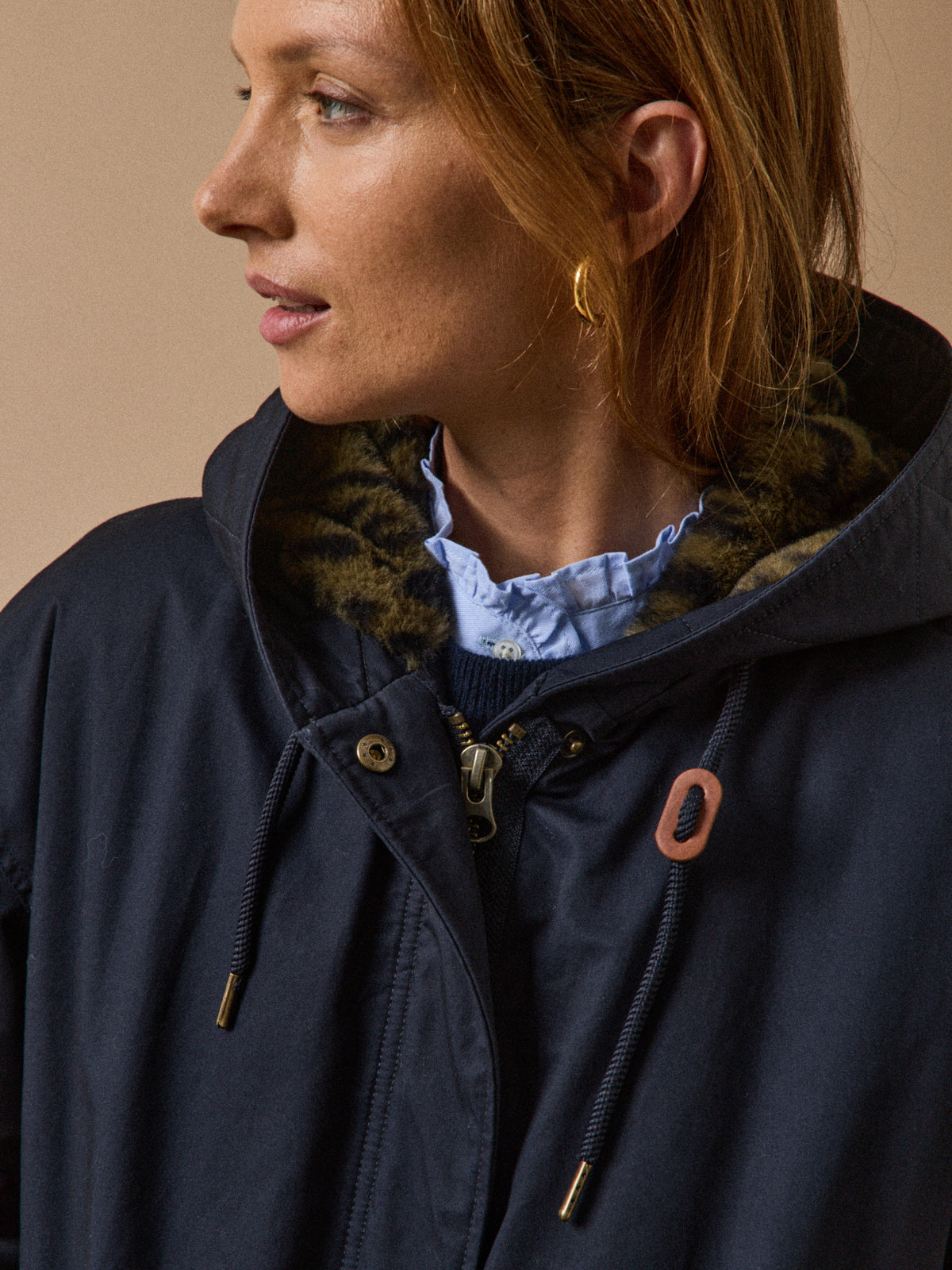 Women's mid-length parka with faux-fur lining
