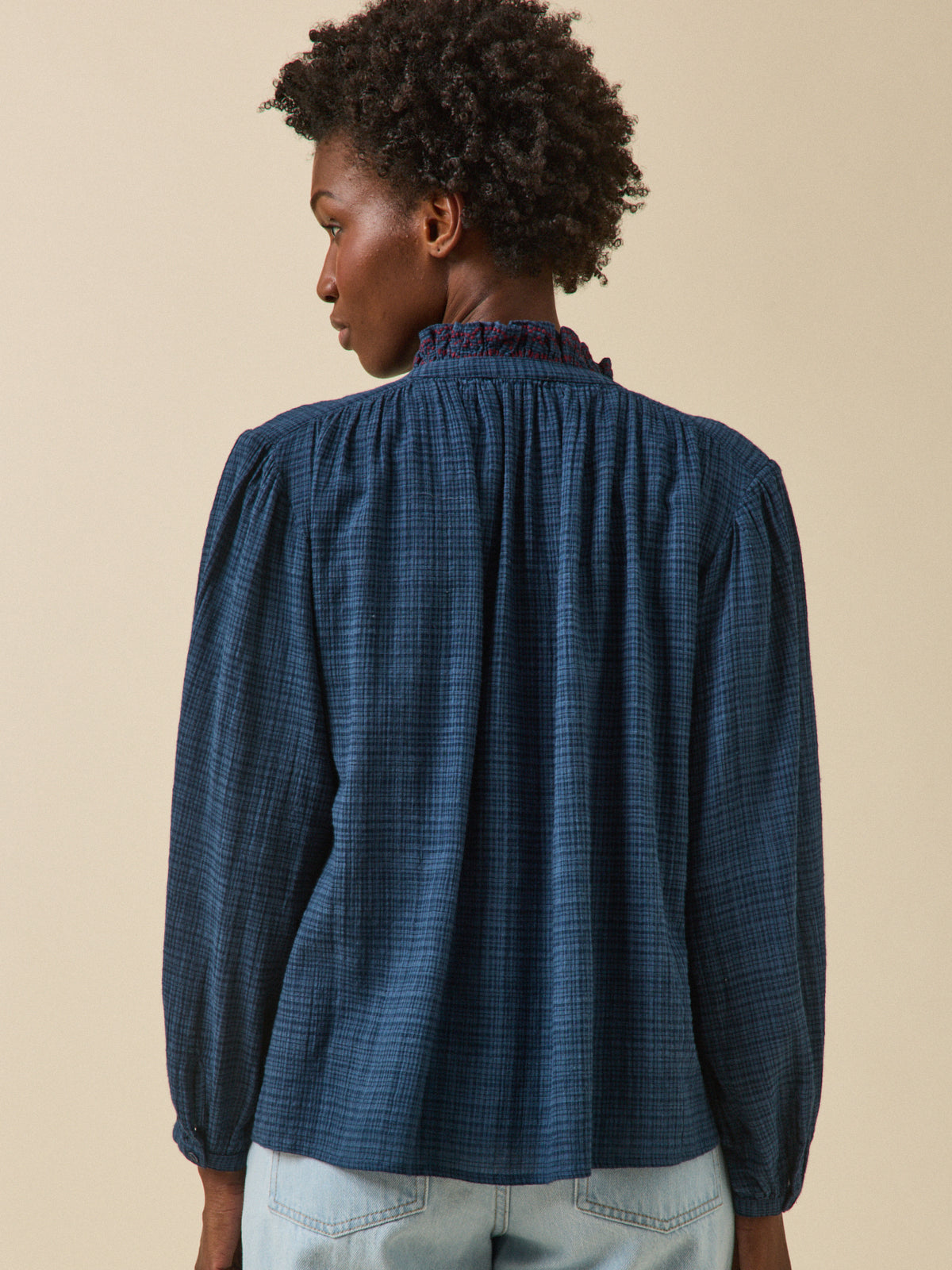 Women's crepon blouse with embroidered ruffle