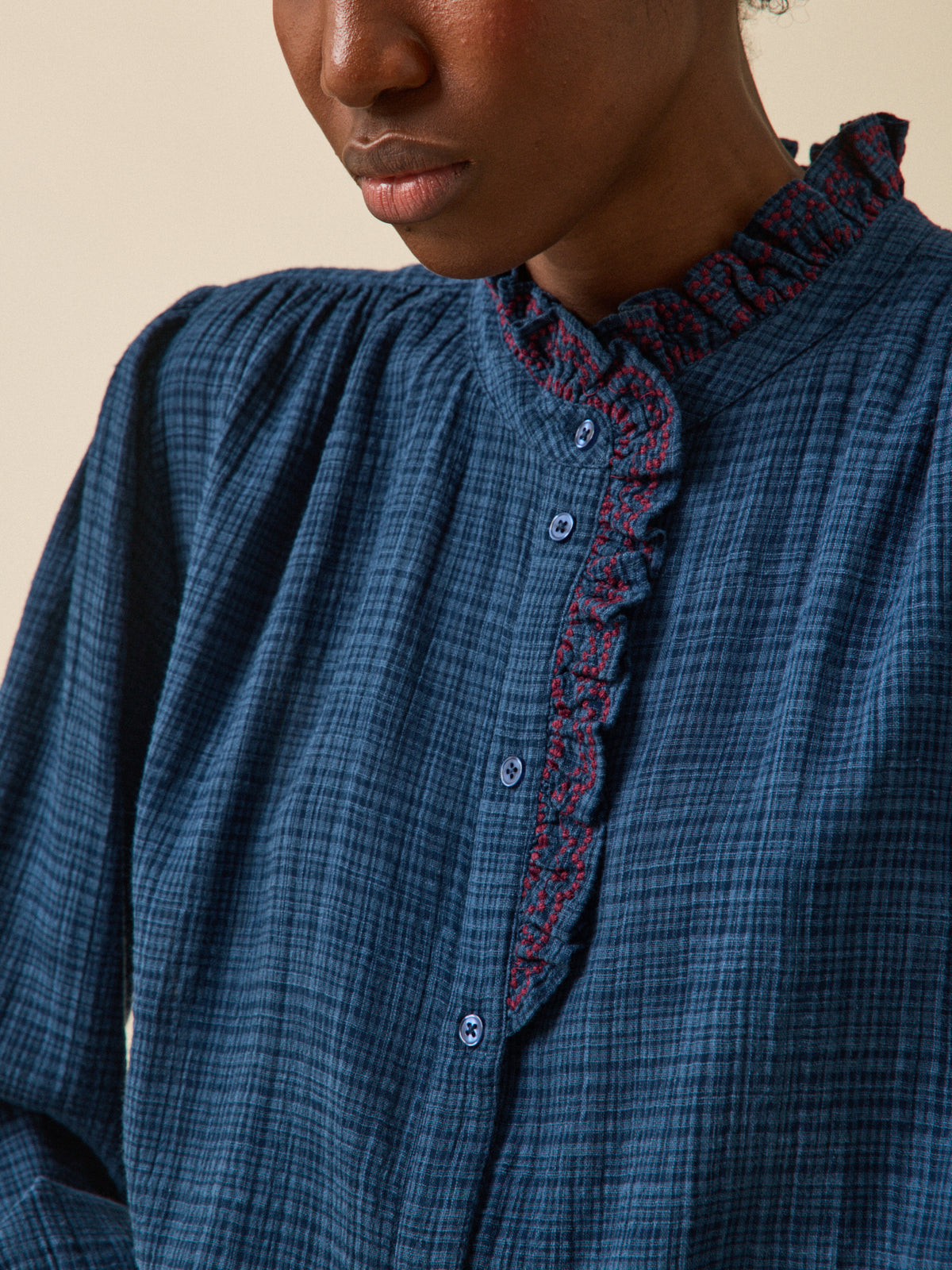 Women's crepon blouse with embroidered ruffle
