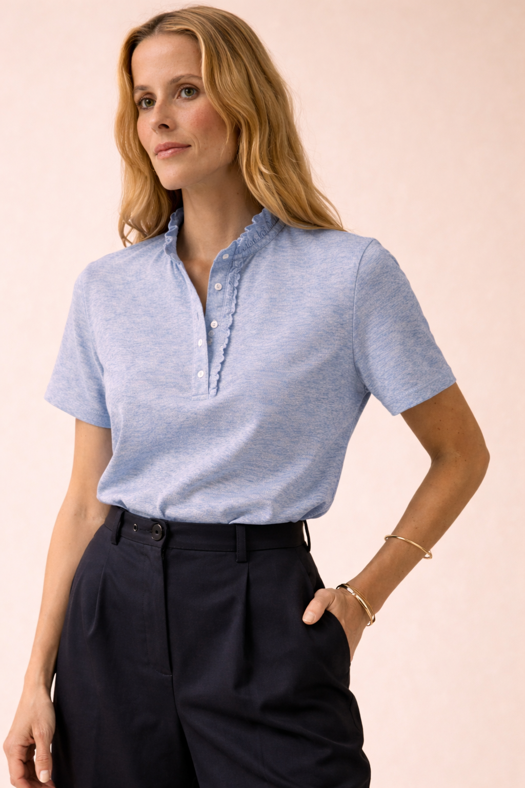 Women's piqué knit polo shirt with ruffled collar
