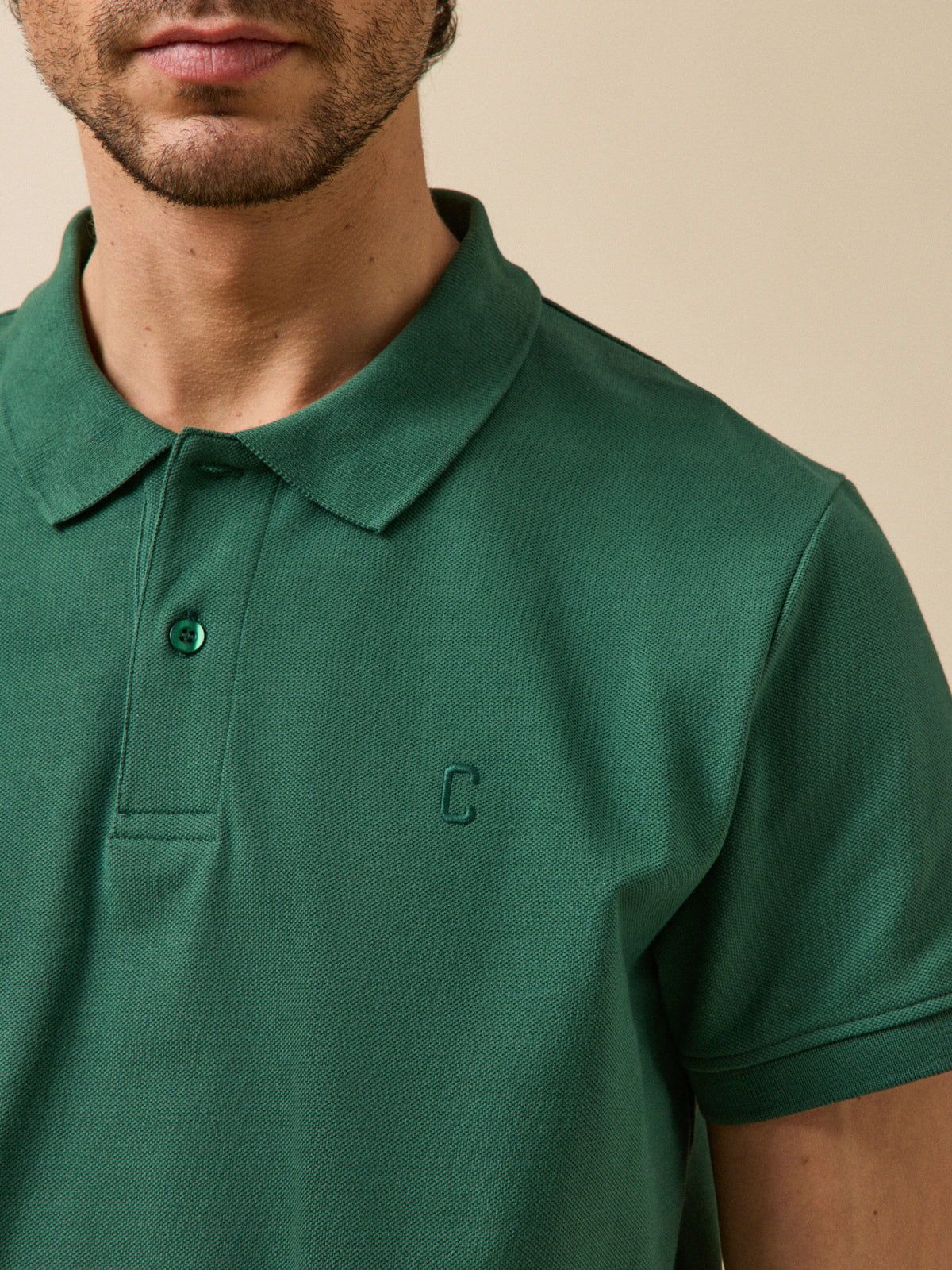 Men's plain piqué knit organic cotton polo shirt