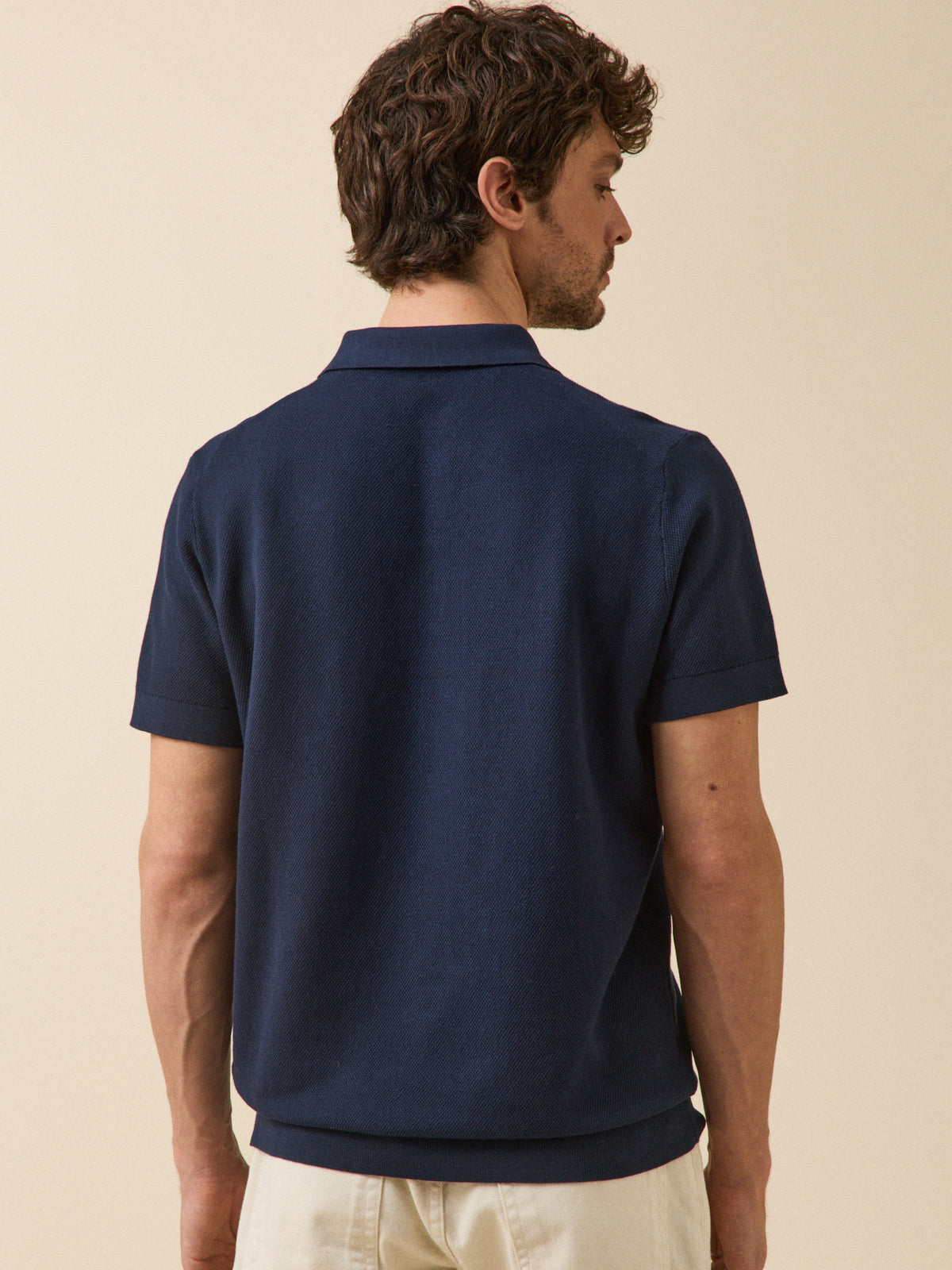 Men's sweater with polo shirt collar and short sleeves