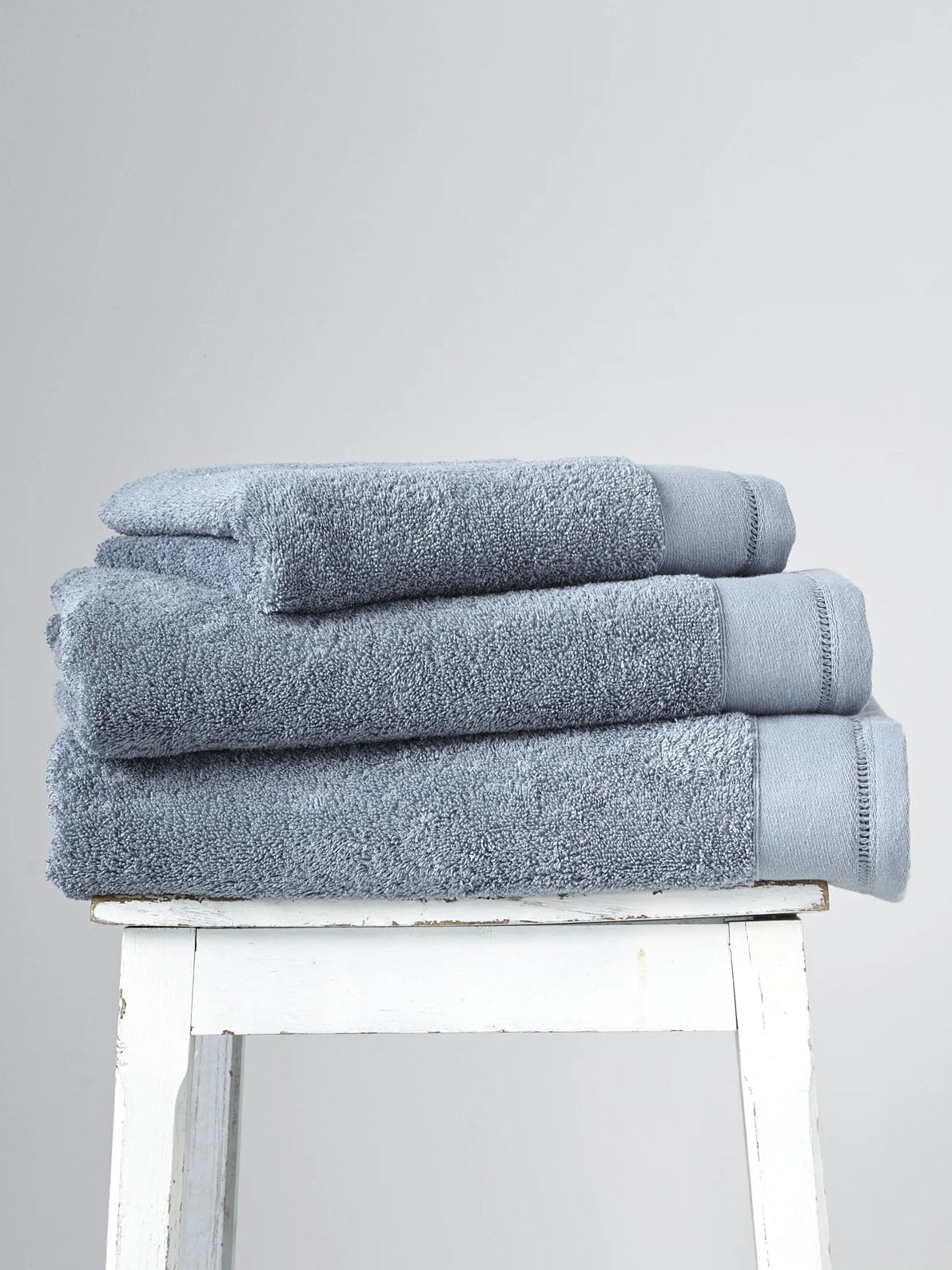 Terry cloth towel with ladderline stitching