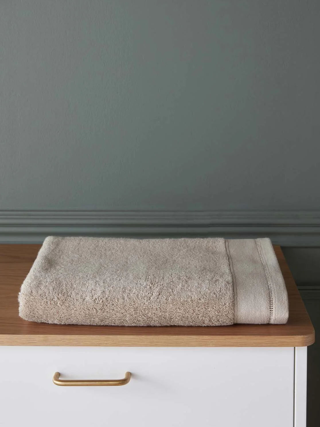 Terry cloth towel with ladderline stitching