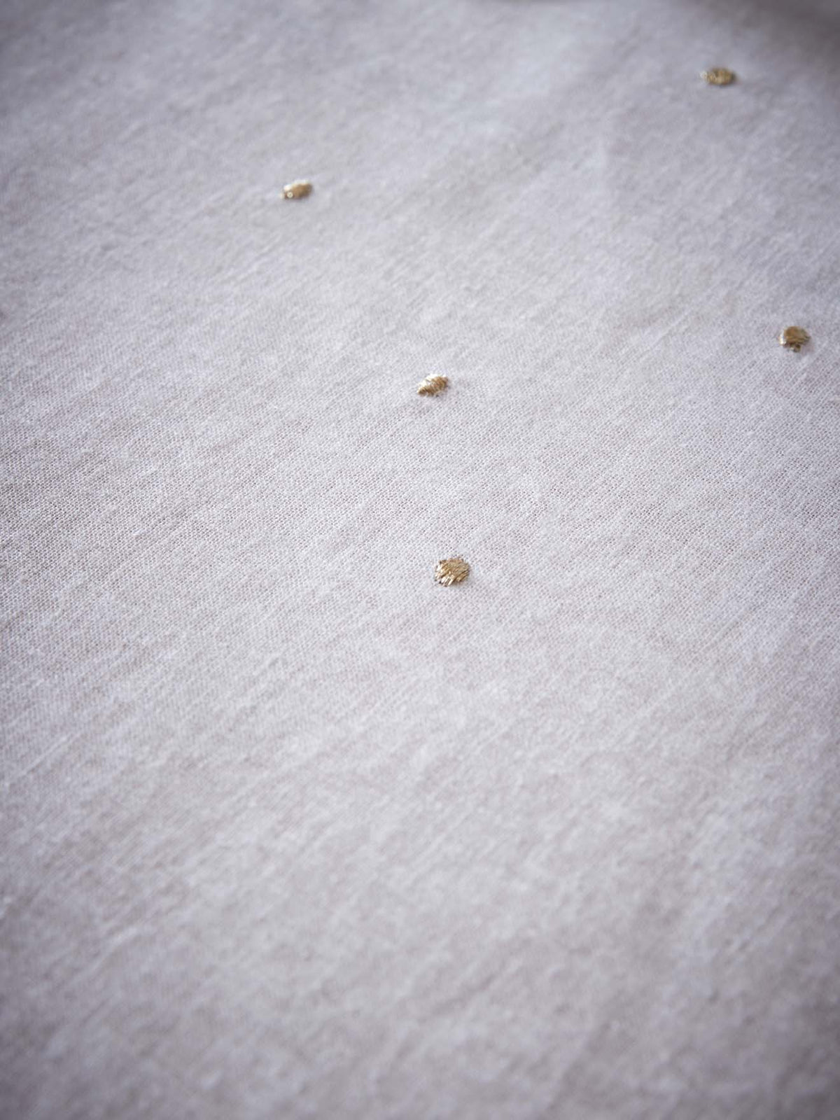 Linen-look woven cotton tablecloth with golden polka dots