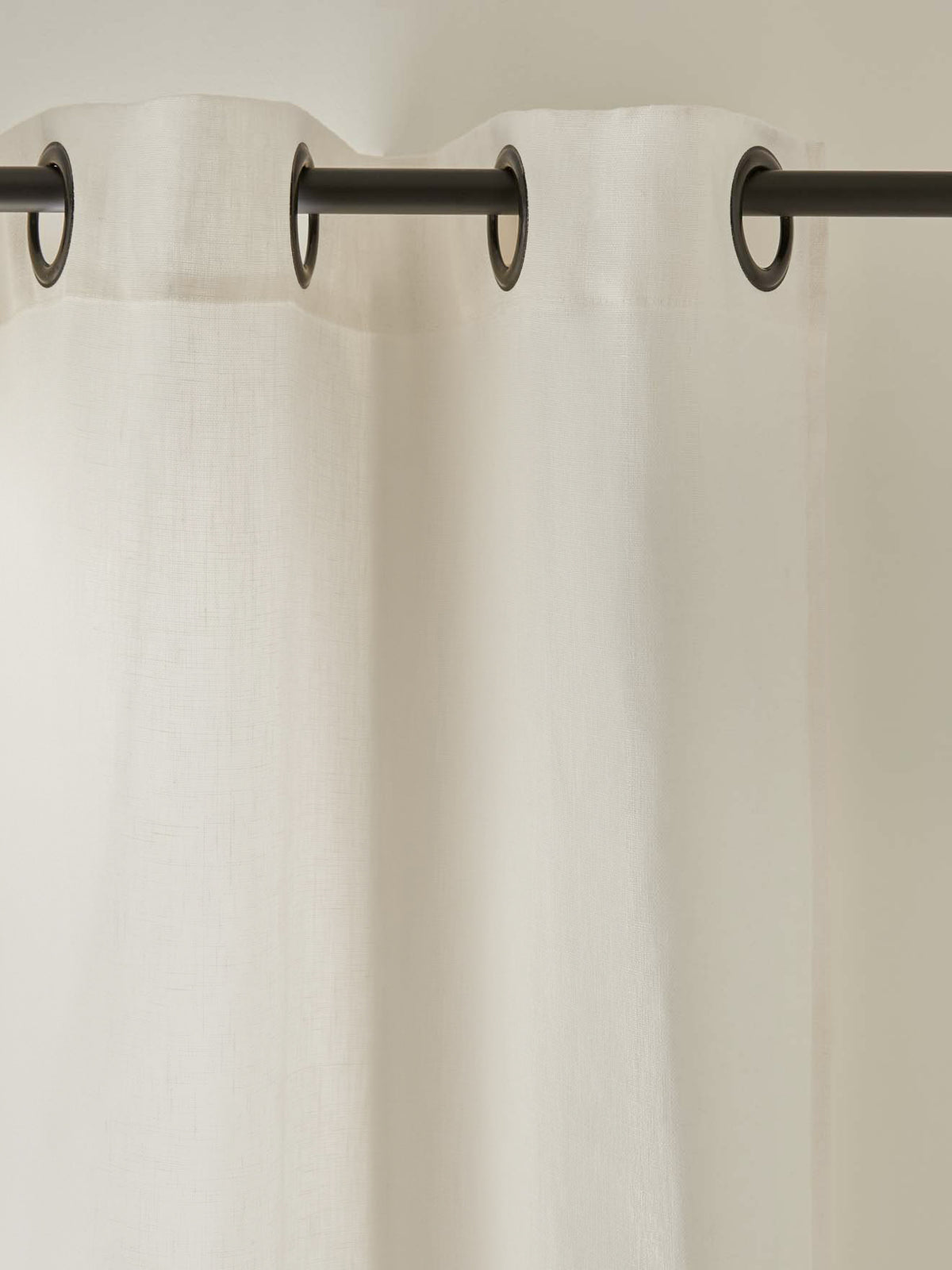 Linen curtain with grommets