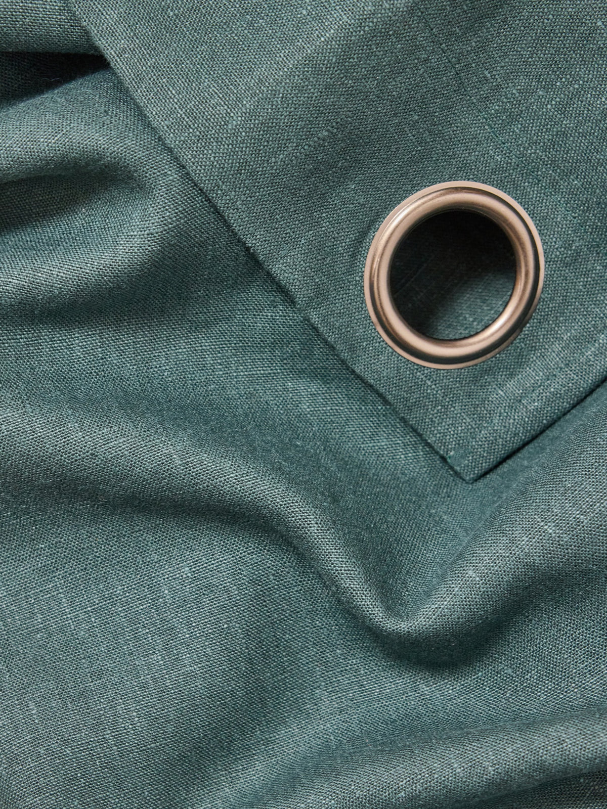 Linen curtain with grommets