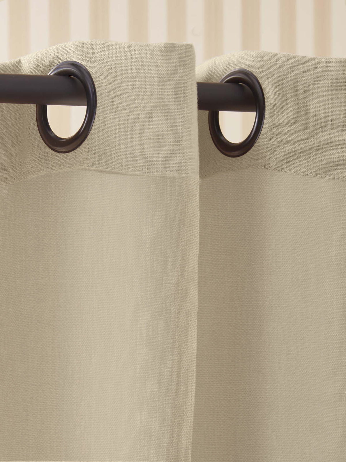 Linen curtain with grommets