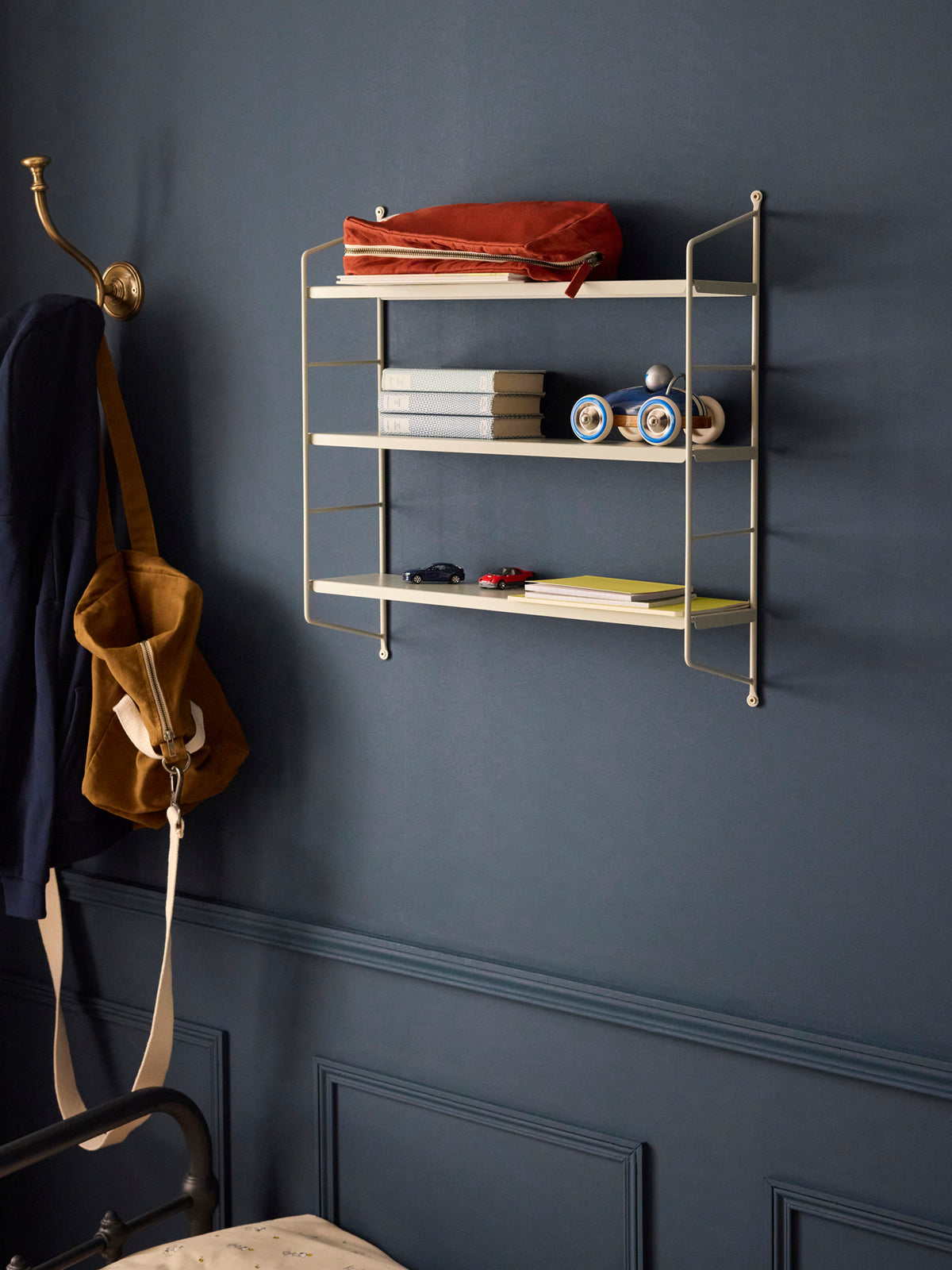 Painted metal wall shelf