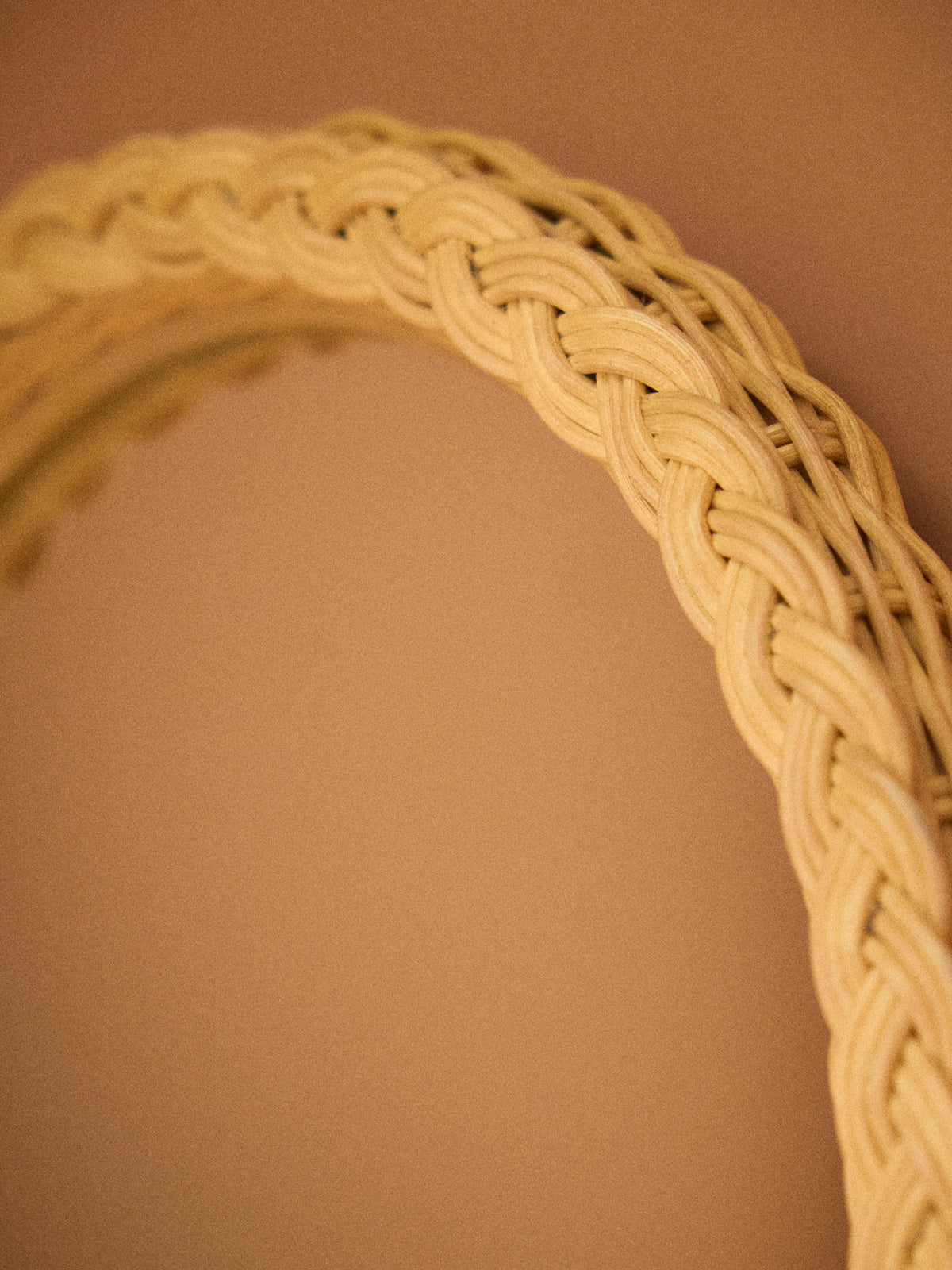 Woven wicker mirror