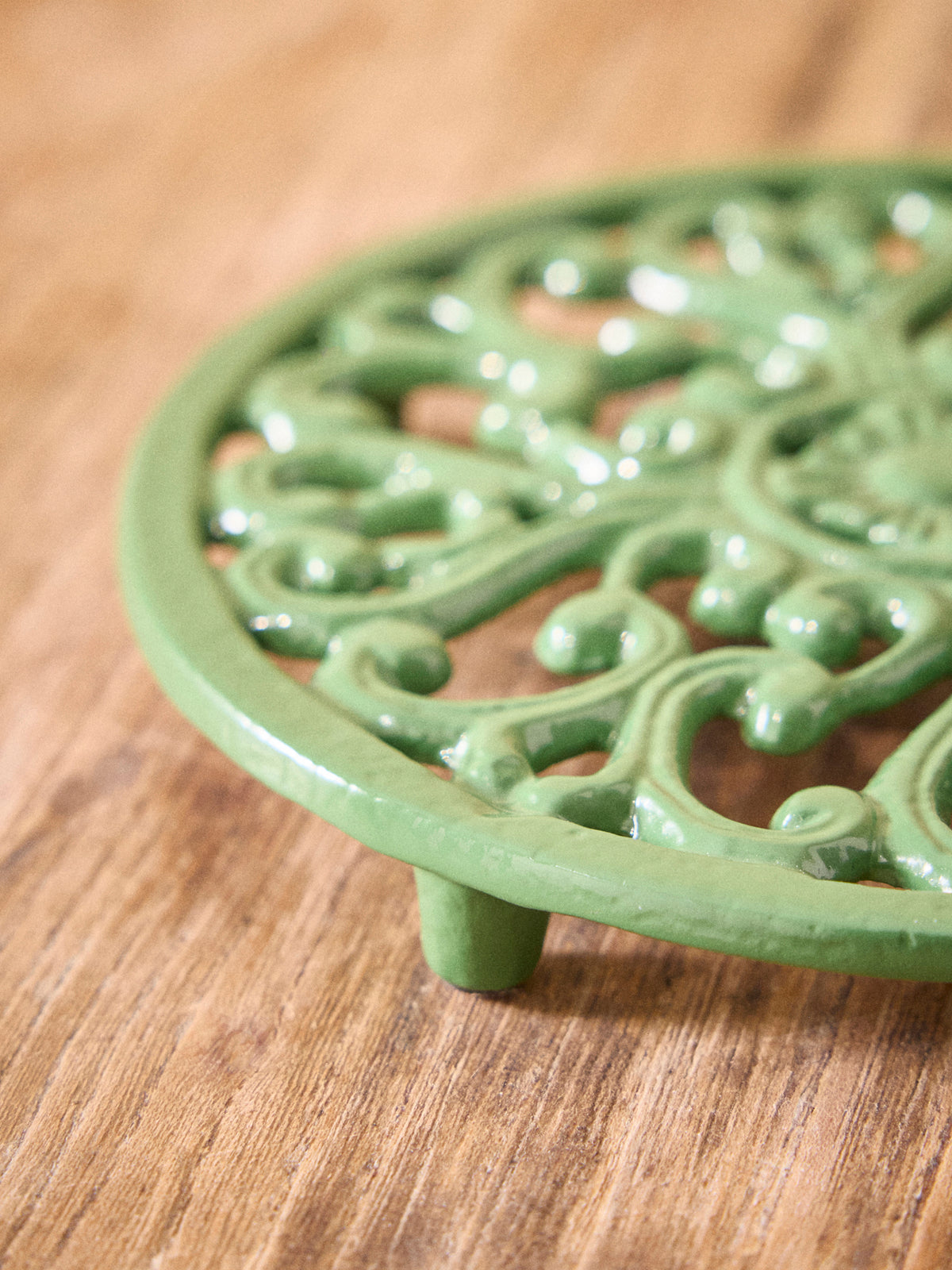 Dessous de plat rond en fonte