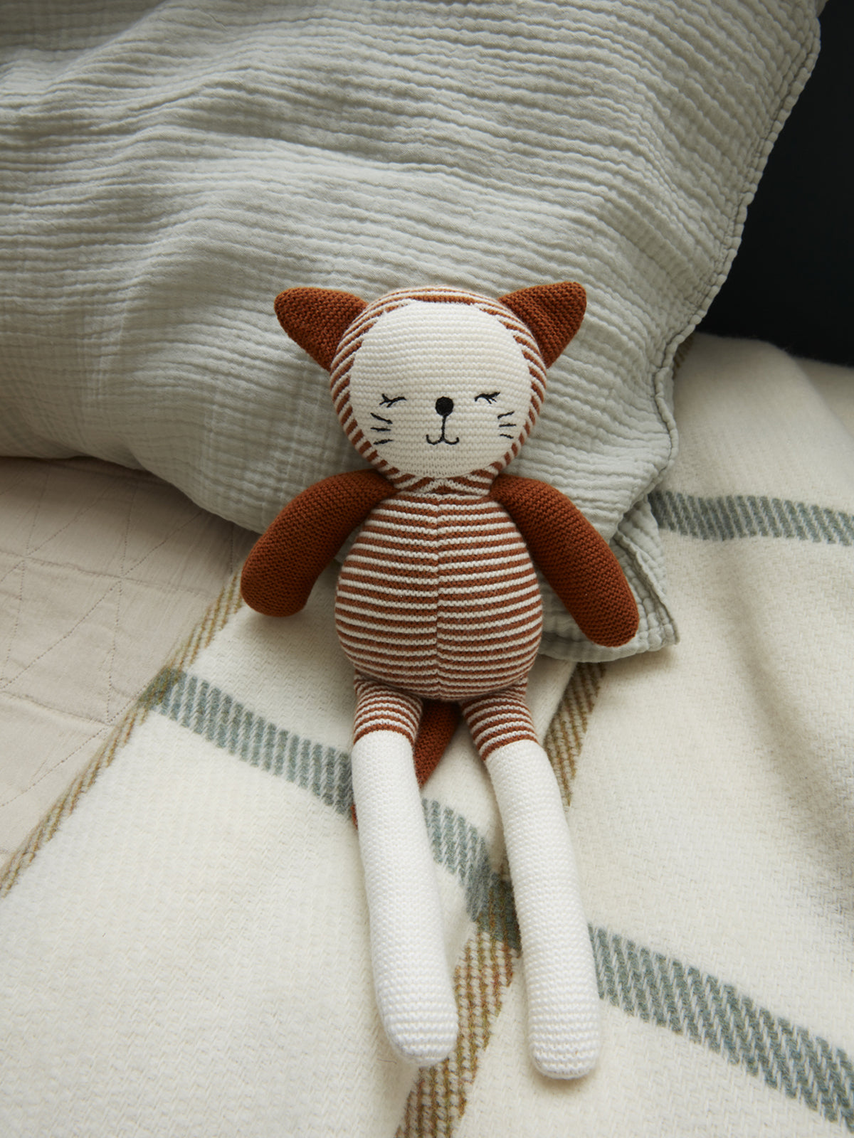 Crocheted cat plush toy