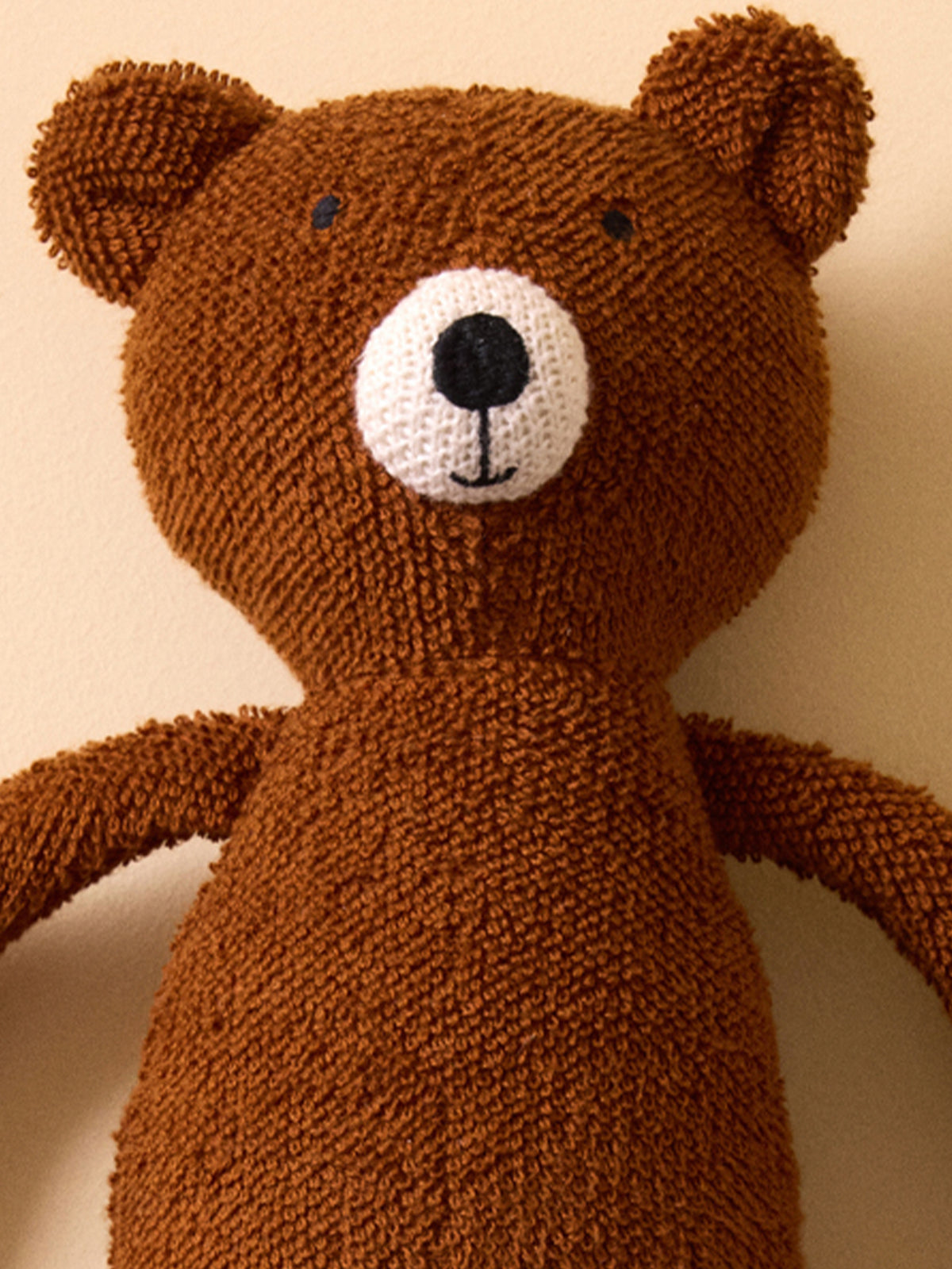Peluche ours en bouclette