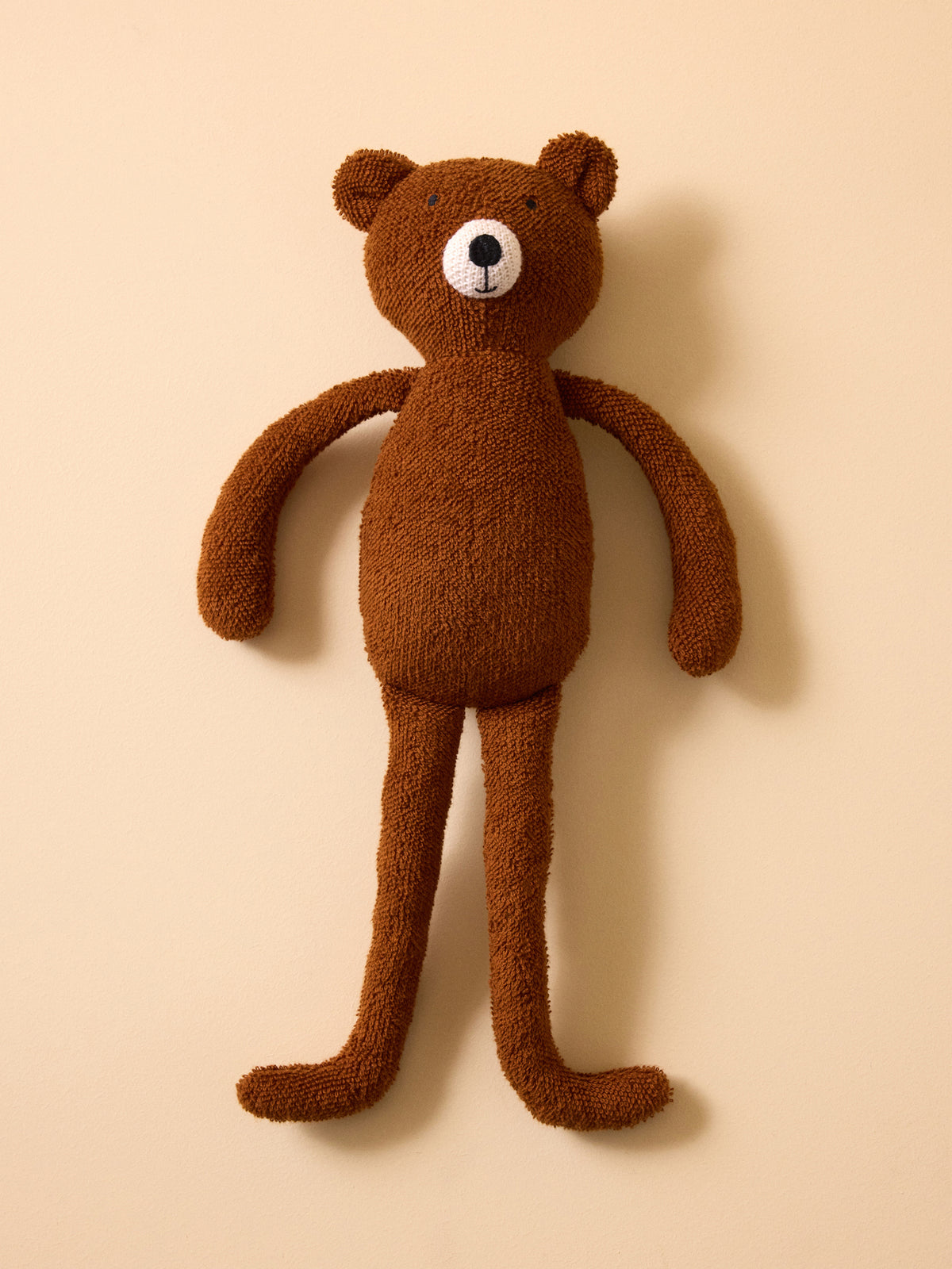 Peluche ours en bouclette