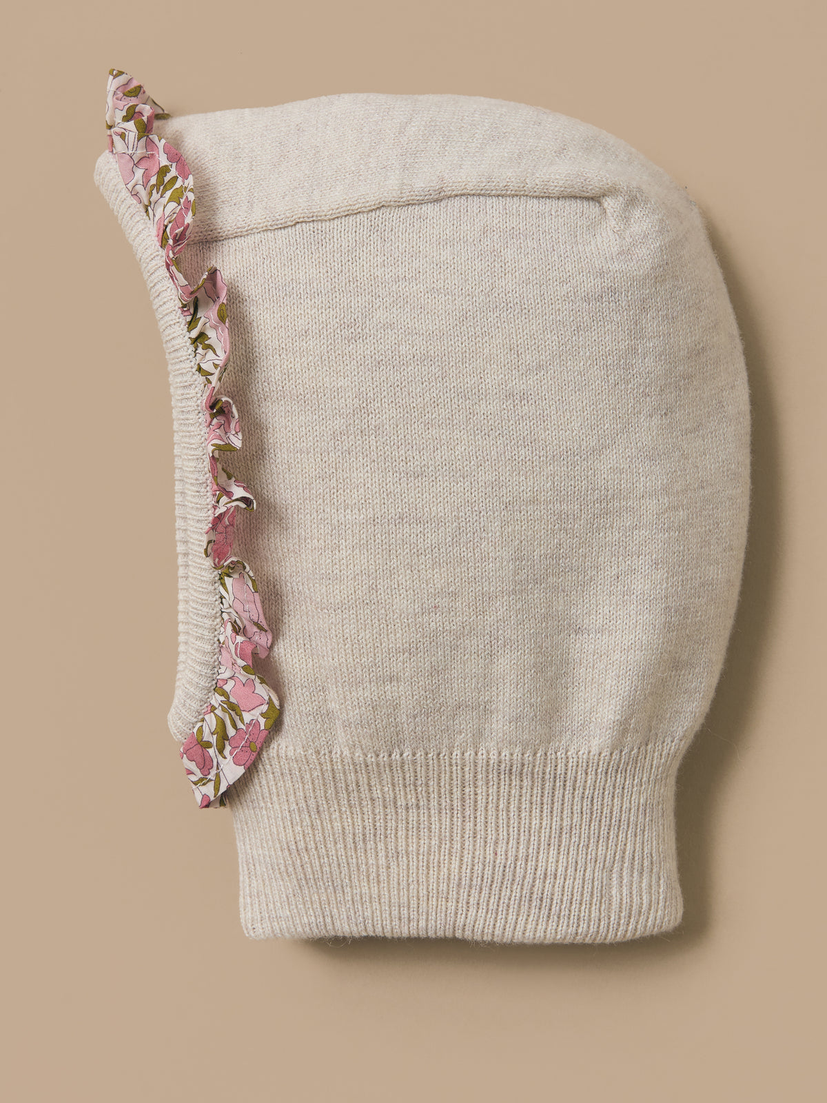 Baby's pullover hood trimmed with a flounce made with Liberty fabric