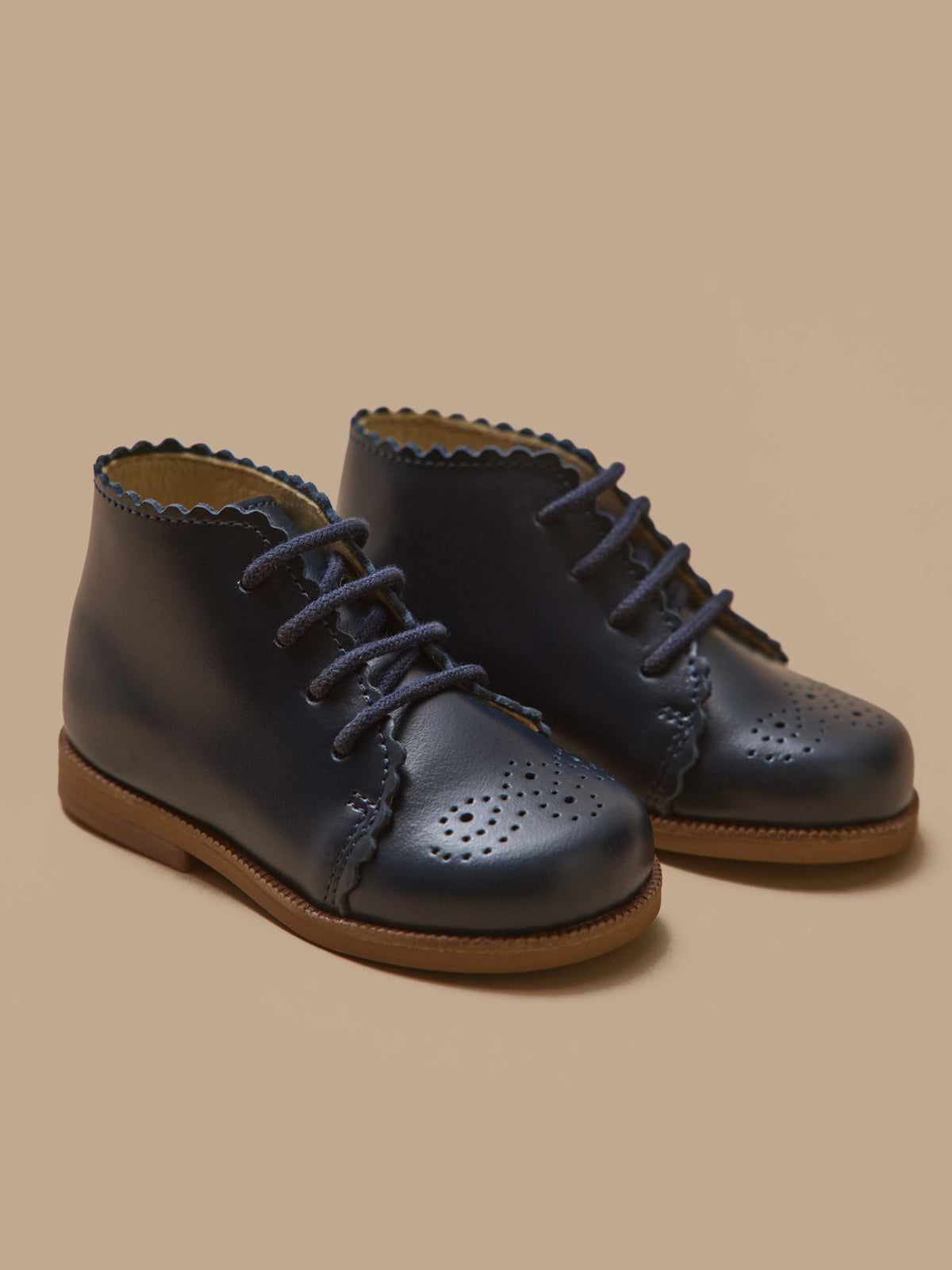 Baby's leather low boots with punch-hole toe