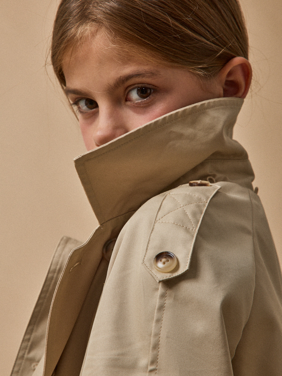 Girl's iconic trench coat