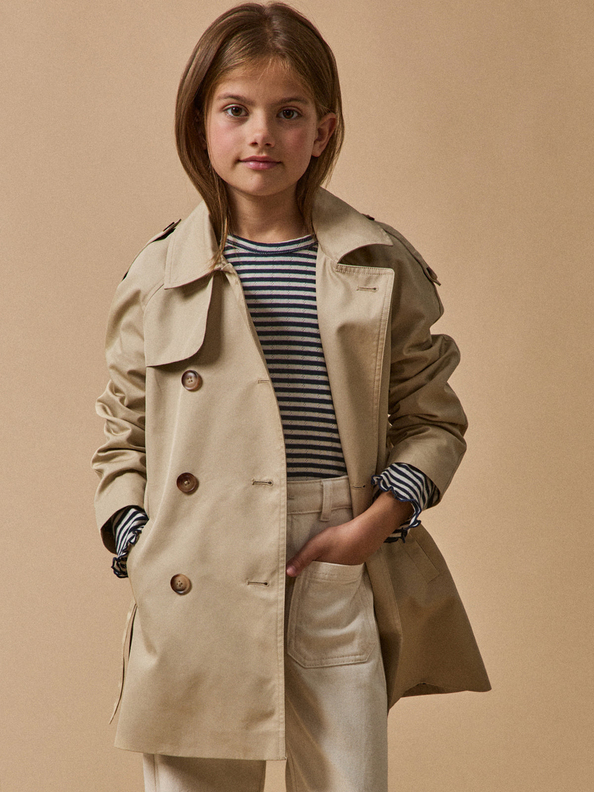 Girl's iconic trench coat
