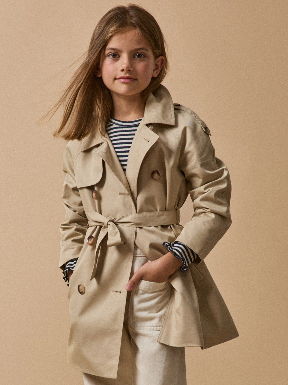 Girl's iconic trench coat