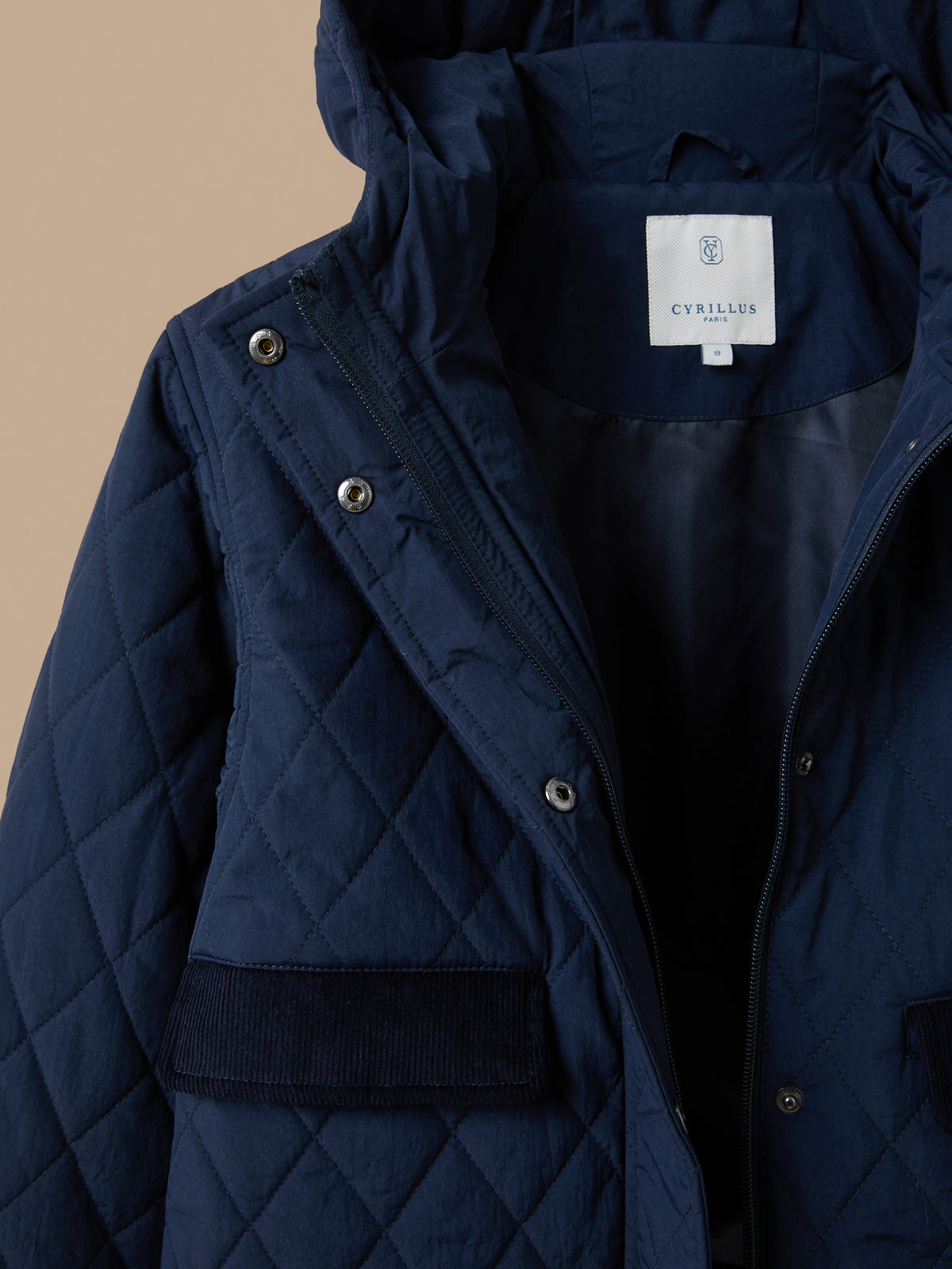 Girl's quilted jacket with high neckline