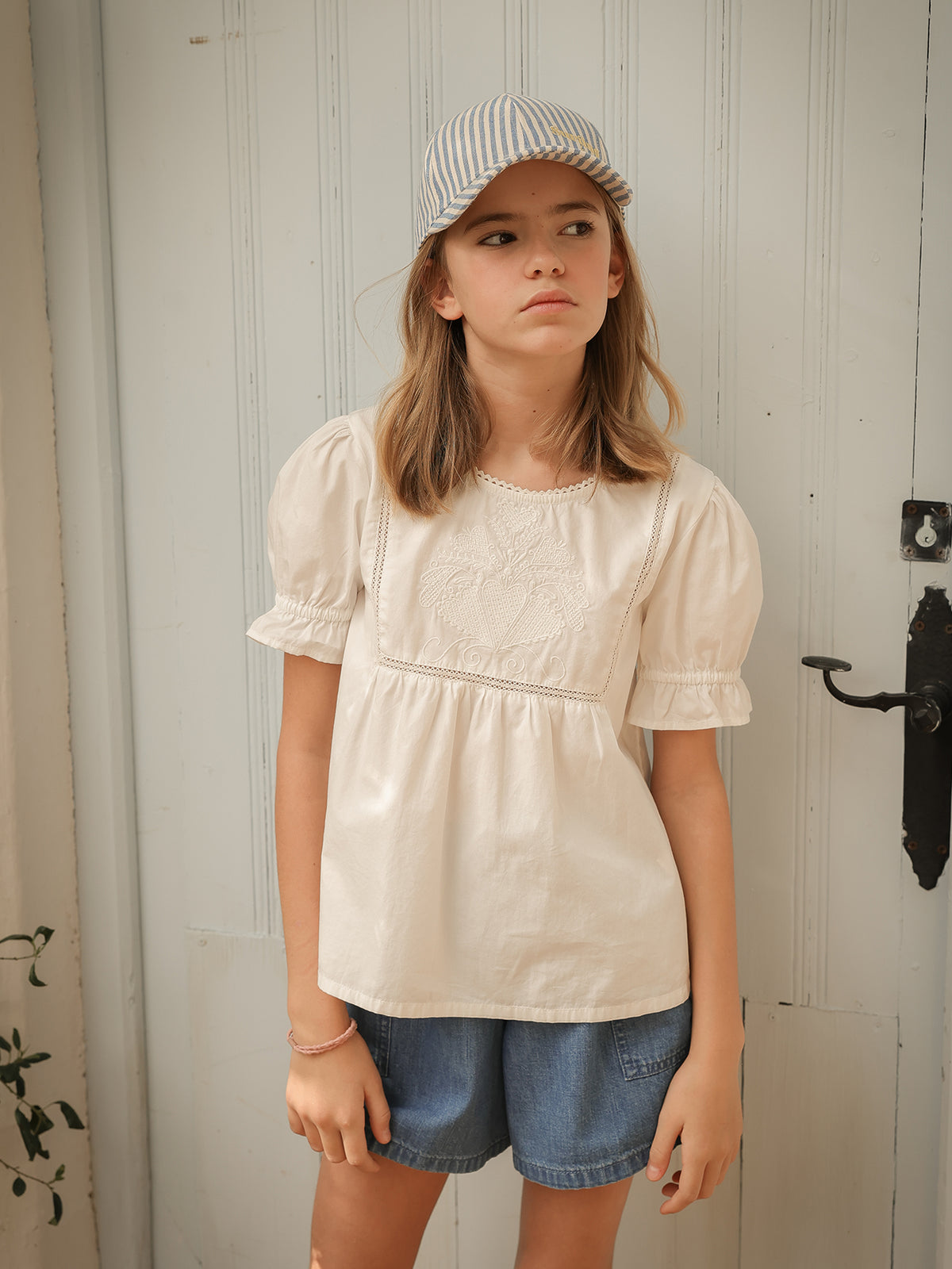 Girl's blouse with embroidered yoke