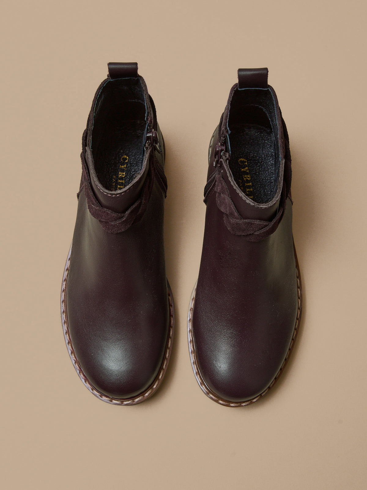Girl's leather boots with braided trim