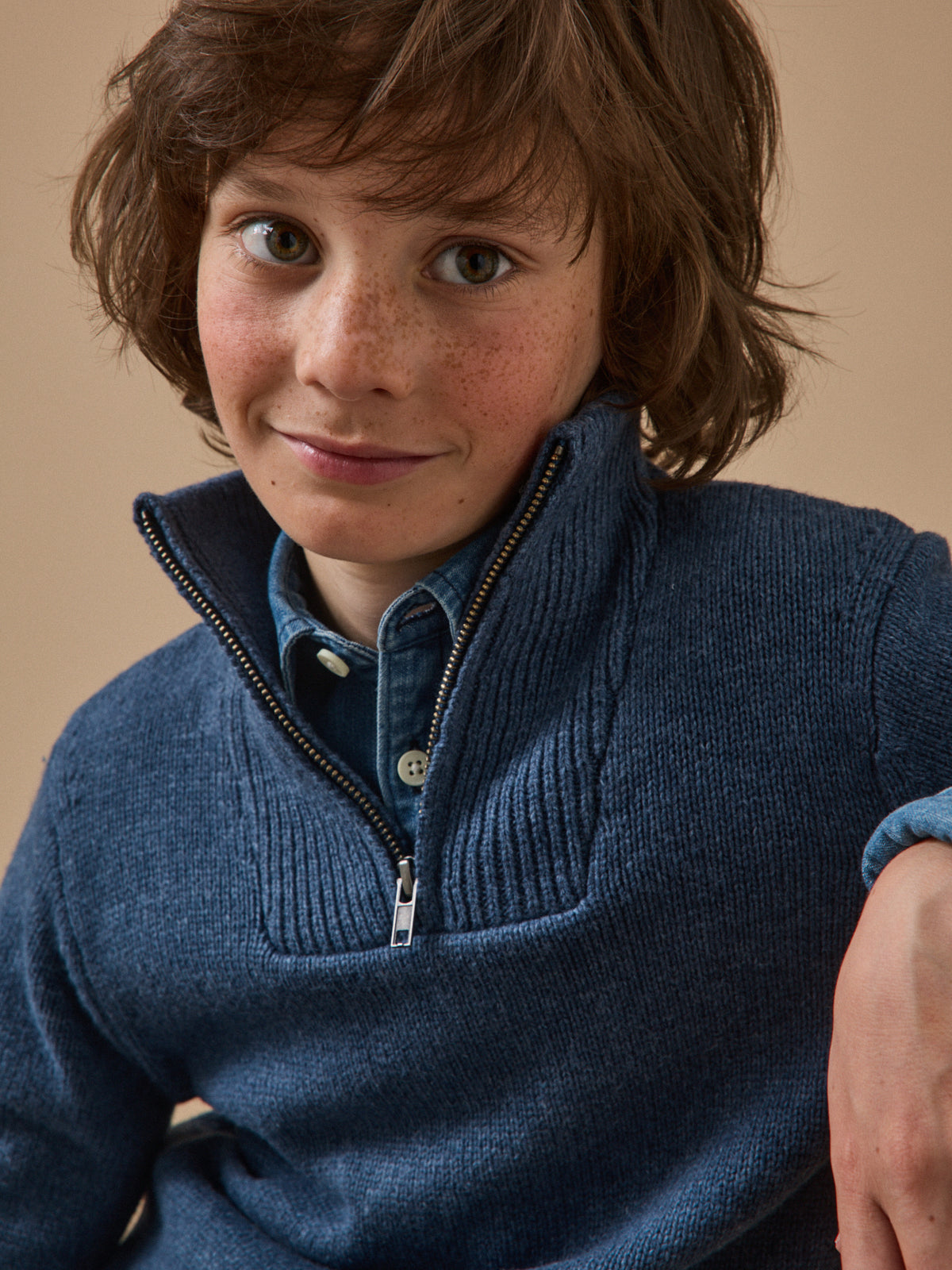 Boy's sweater with high zip neckline